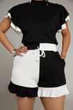 Black and White Short Sleeve Top with Ruffle Sleeve Detail